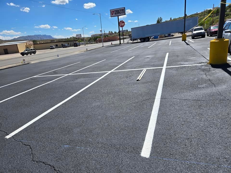 Freshly paved and striped parking lot in El Paso