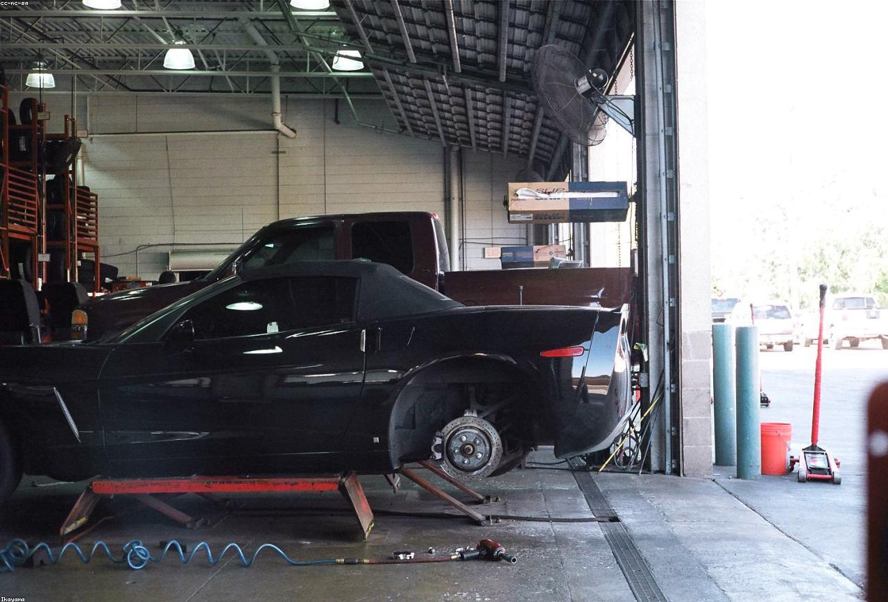 Vehicle on a lift in the service bay