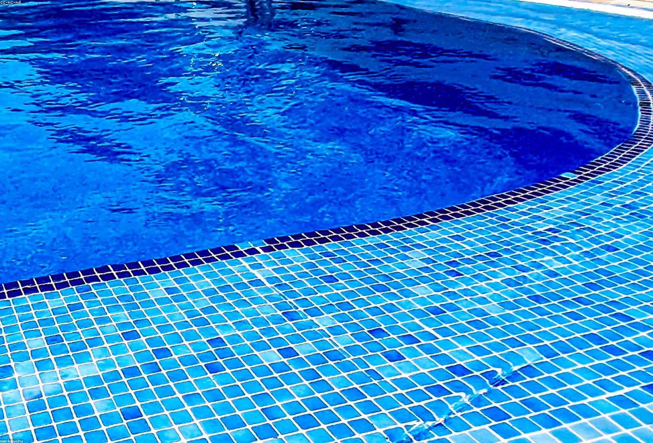Perfectly balanced clear blue pool water