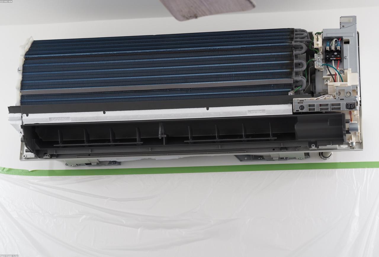 Wall-mounted mini-split air conditioning unit