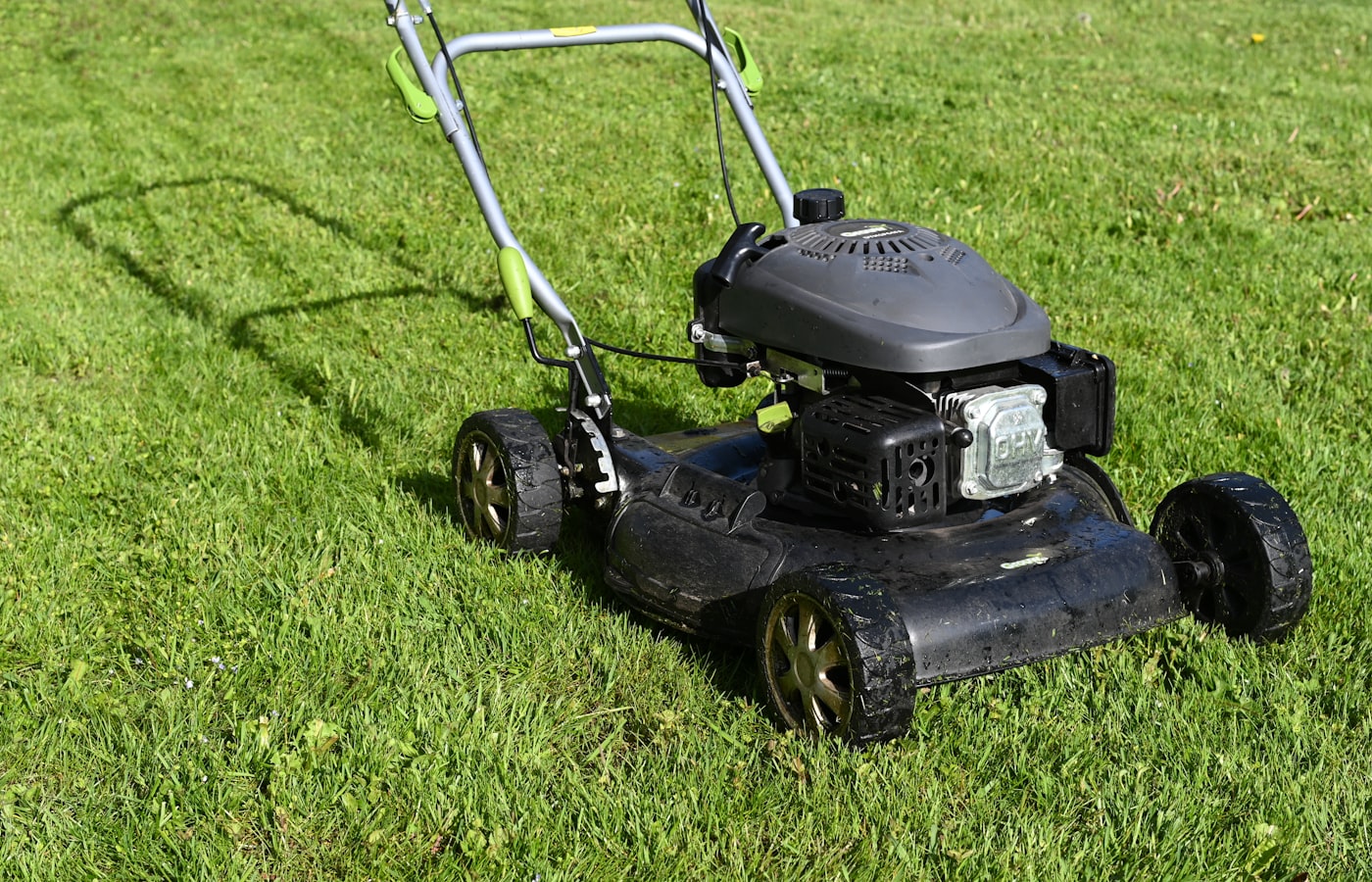 Mower on a striped lawn