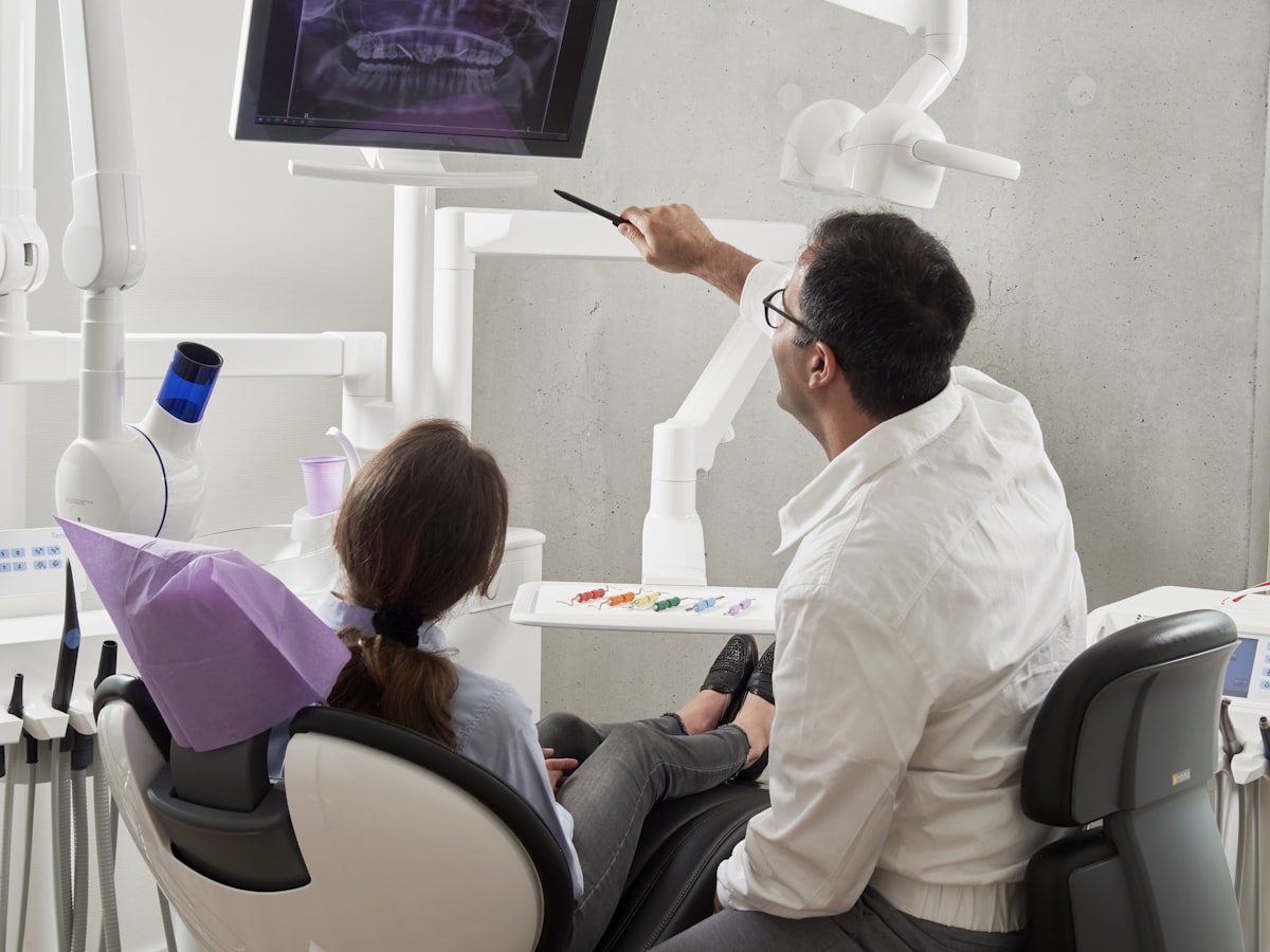 Ivory Lane dentist gently caring for a patient