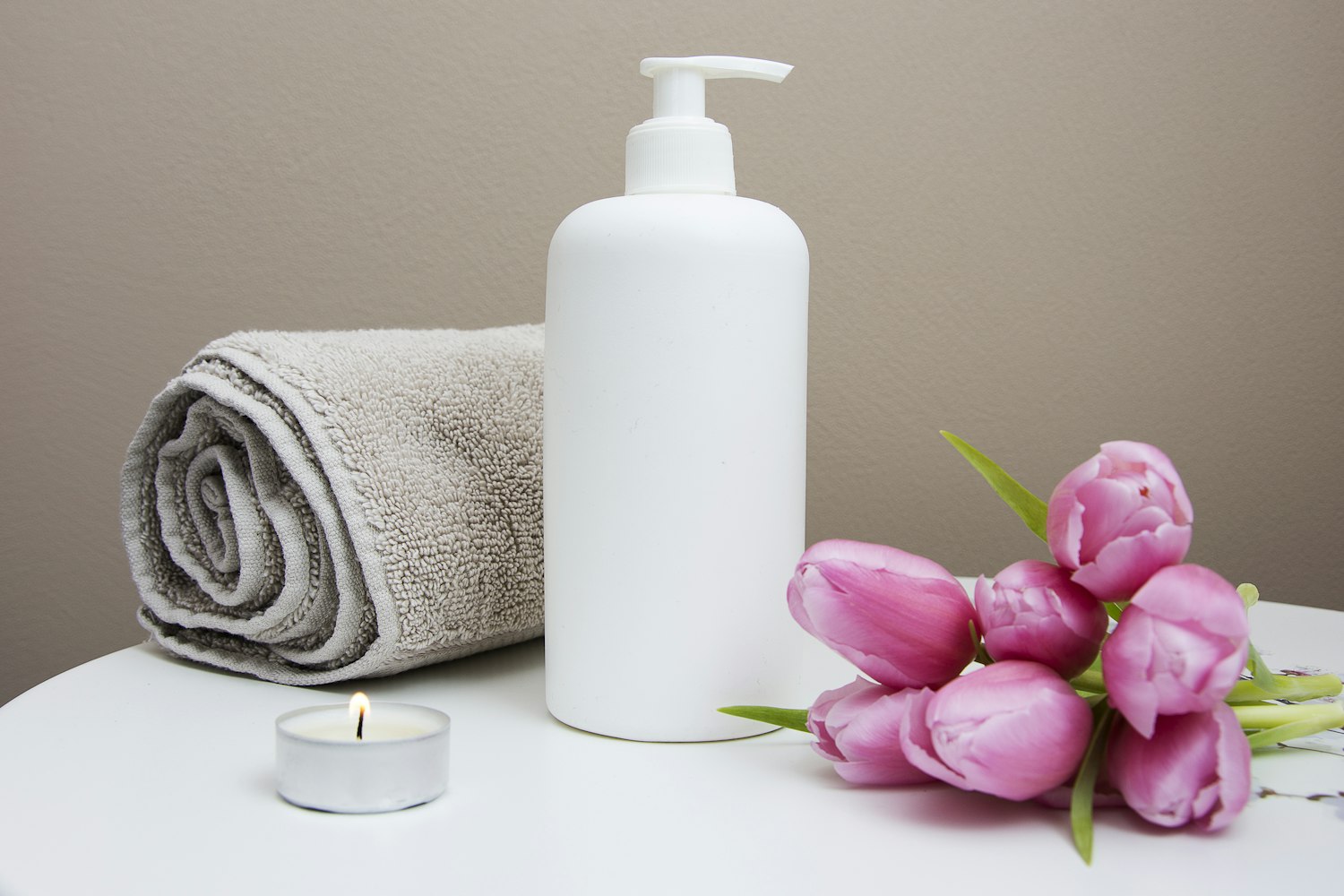 Calm, softly lit treatment room details at Lumière Aesthetics