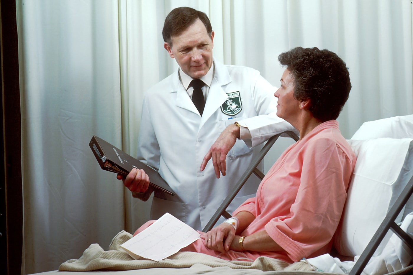 Wellspring physician caring for a patient