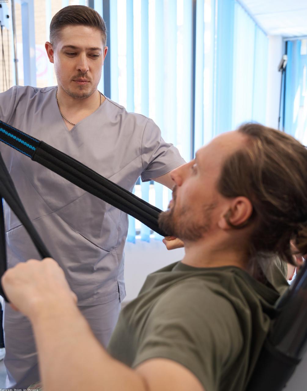 Physical therapist working with a patient
